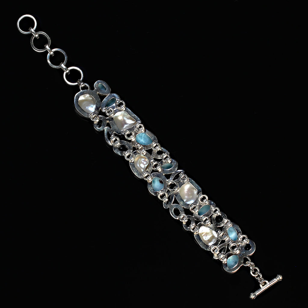Magnificent bracelet of Biwa Pearl, Blue Topaz, and Larimar Bezel set in Silver