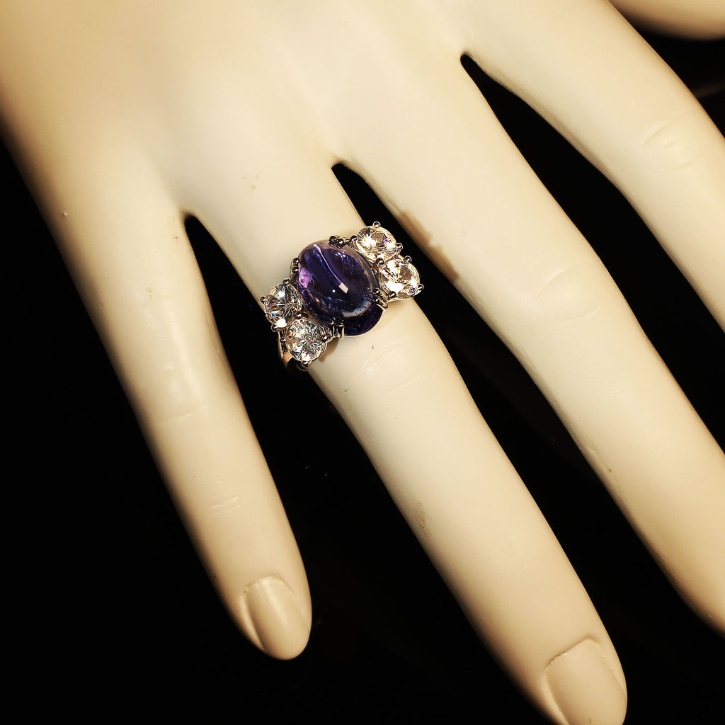 Dinner ring of Cabochon Tanzanite and Sparkling Cambodian Zircons