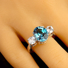Elegant Blue Topaz and Sparkling Genuine Zircon Ring