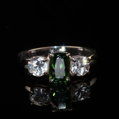 Sparkling Oval Green Tourmaline accented with Scintillating Cambodian Zircons