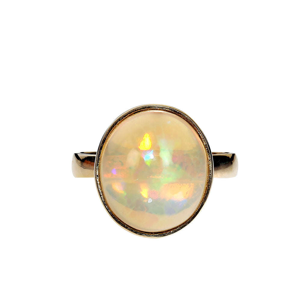 Delightful Round Opal in 18KT Gold Ring