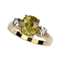 Super Oval Sphene accented with White Sapphires in Gold and Sterling Silver Ring